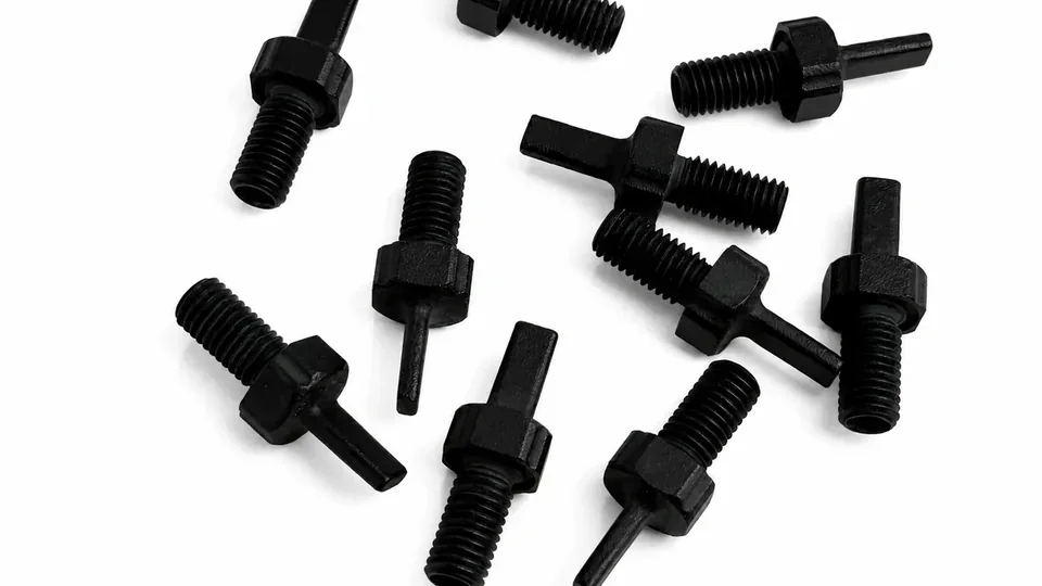 Black hard-anodized Aluminum 6061 threaded components produced with additive and CNC processes.