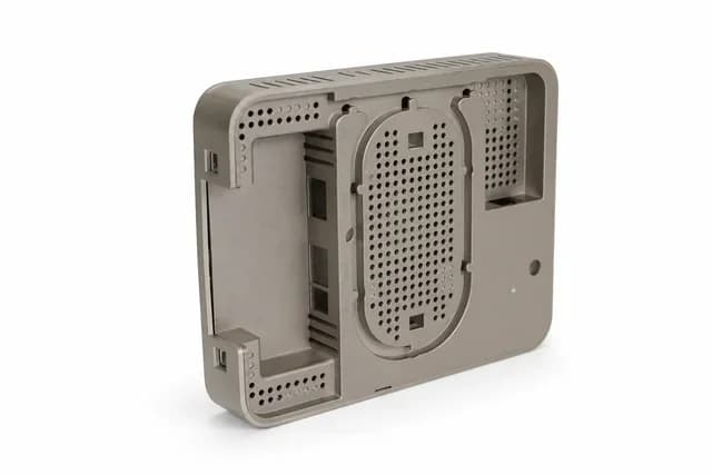 Prototype enclosure component with ventilation features.